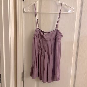 Purple tank top, size small, cute summer top and flattering pattern on it.